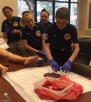 Labor and delivery nurses at Community Medical Center offer practice with a childbirth mannequin 